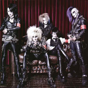 Omega Dripp ‎– Shout At The New Devil